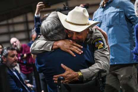 Uvalde County Sheriff Ruben Nolasco hugs Texas Governor Greg Abbott as they attend a vigil for the victims.