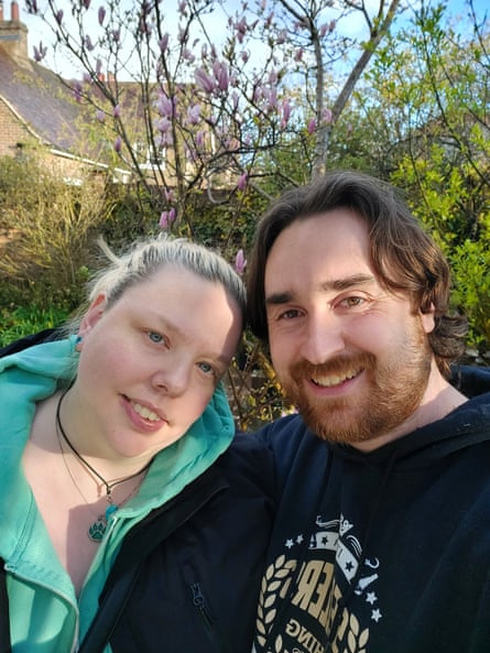 John and Caroline Sellers smiling in a garden