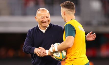 Jones greets the Wallabies' Nic White during England's 2-1 Test series win over Australia last year.