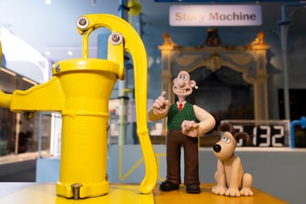 Wallace and Gromit inspecting a pump at the Young V&A