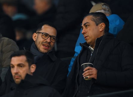 Liam Rosenior talks to the Chelsea co-owner Behdad Eghbali before kick-off against Fulham