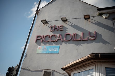 A sign for Reform on the front of the pub