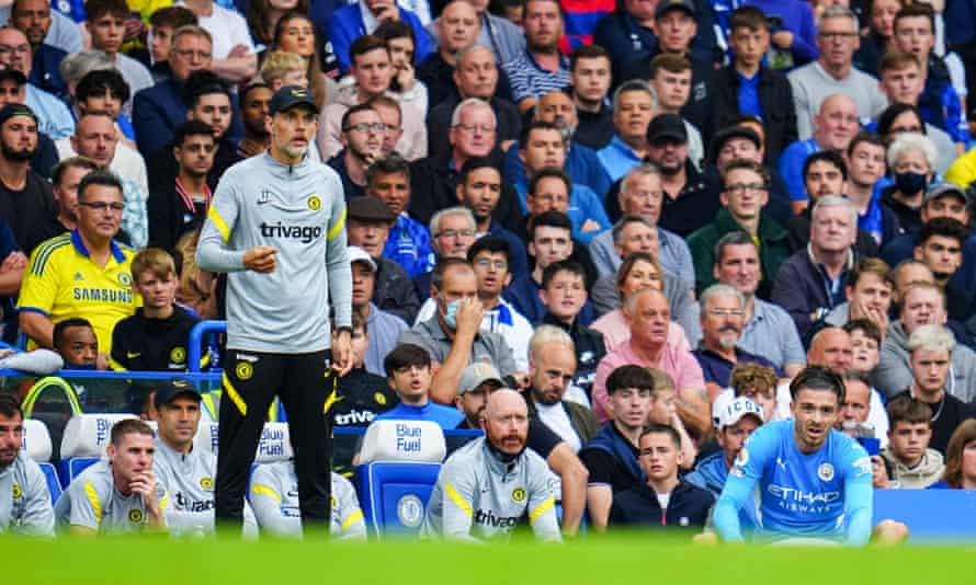Thomas Tuchel watches as Jack Grealish accepts a free throw.