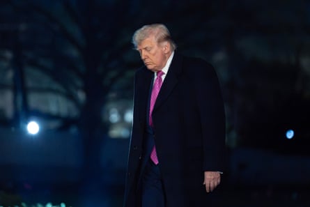 Donald Trump walking on the South Lawn of the White House