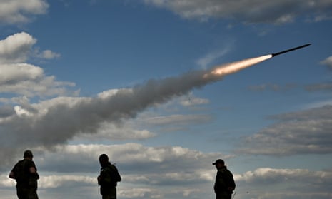 Ukrainian troops fire a Partyzan multiple launch rocket system in Zaporizhzhia region.