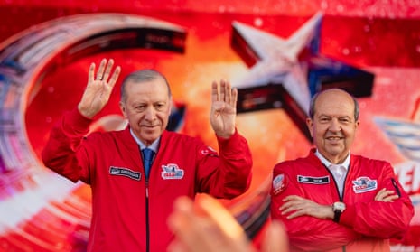 Recep Tayyip Erdoğan (l) with northern Cyprus's leader, Ersin Tatar.