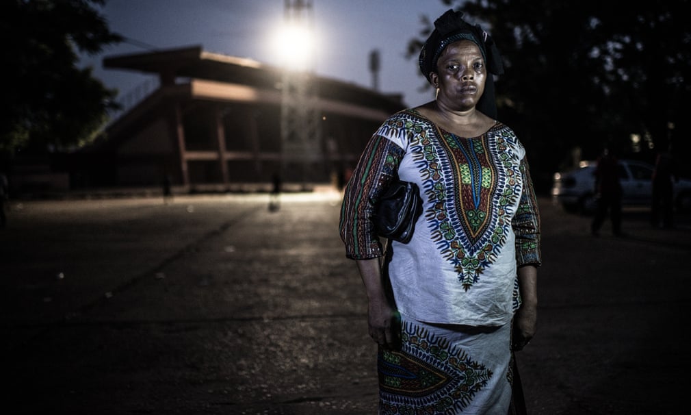 Aissatou Lamarana Barry, photographed outside the national stadium where she was abused by members of the security forces: ‘I was raped behind the stadium. Since then I can’t understand my life. I was breastfeeding and my husband abandoned me. My children can’t go to school and I can’t pay my rent’