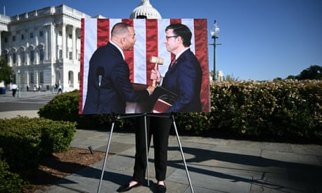 A photo of Democratic House minority leader, Hakeem Jeffries (left), with Republican speaker Mike Johnson (right), displayed this morning outside the US Capitol.