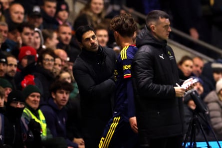 The Arsenal manager, Mikel Arteta, talks to Max Dowman after he was sent off during the Carabao Cup match against Fleetwood.