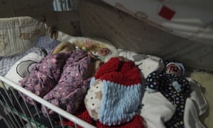 Premature babies who were left behind by their parents lay in a bed in hospital number 3 in Mariupol, Ukraine, Tuesday, March 15, 2022.