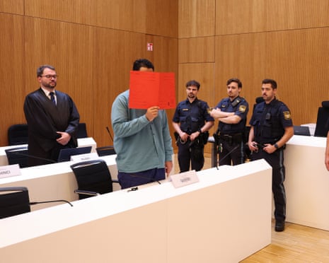 Afghan defendant identified as Farhad N accused of deliberately steering a car into a 1,400-strong trade union march in February 2025.