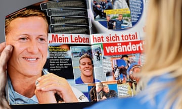A woman reads the edition of Die Aktuelle with a fake interview with Michael Schumacher.