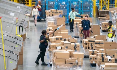 Amazon workers sort packages on Thursday in Appling, Georgia. 