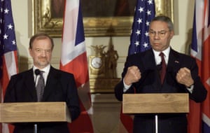 Powell makes a point as the then British foreign secretary, Robin Cook, looks on during a joint press conference in 2001