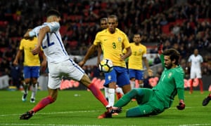 Miranda combines with the goalkeeper Alisson to deny England’s Dominic Solanke last November.