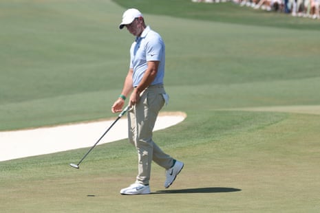 Rory McIlroy of Northern Ireland misses a putt on the second green.