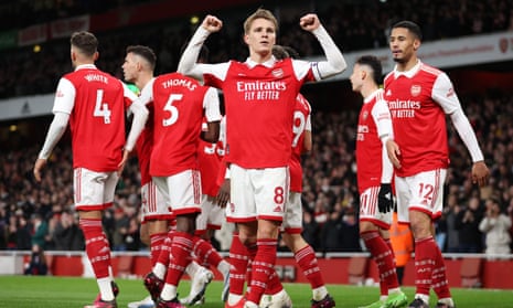 Martin Odegaard celebrates after scoring the team's third goal.