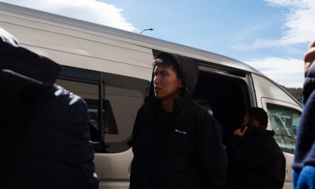 A man queues for the draft bus in Buryatia