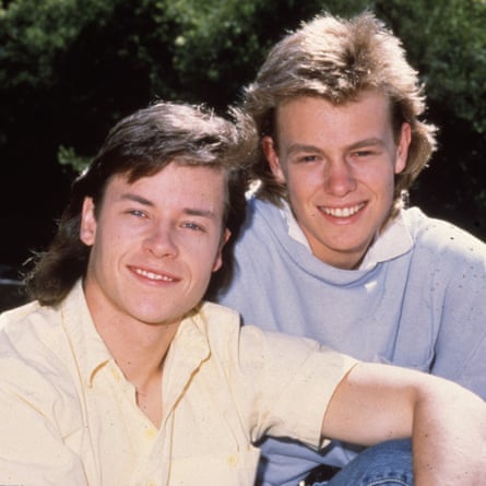 Guy Pearce as Mike Young and Jason Donovan as Scott Robinson in Neighbours