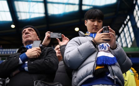 Fans and their phones astatine Stamford Bridge.