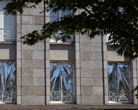 Emergency blankets cover windows in Brest, western France.