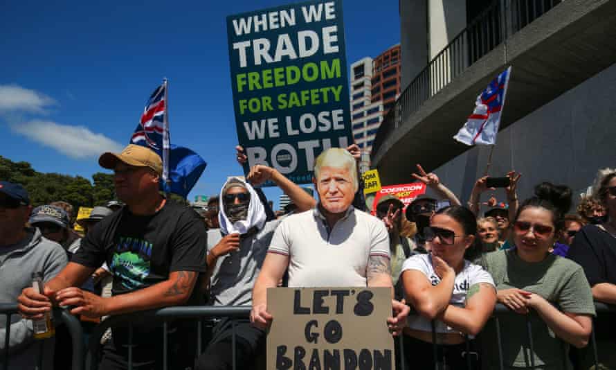 A protestor wears a Donald Trump face mask during an anti-vaccine mandate protest in Wellington, New Zealand.