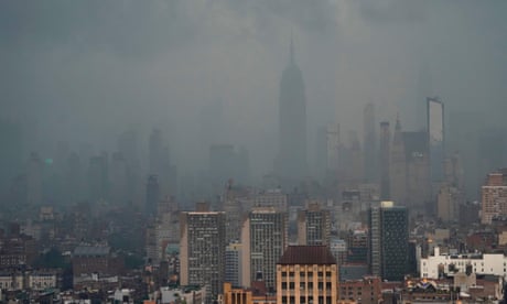 Rain covers the Empire State building in New York as Tropical Storm Elsa moves up the north-east.