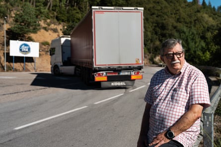 Carles Lumeras in the Montseny region of Spain, sitting by the side of the road with a truck behind him