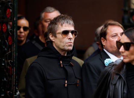 Oasis frontman Liam Gallagher leaves the cathedral.