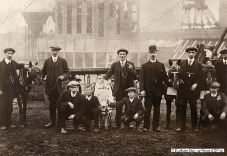 Pit ponies being prepared for a carnival at Horden colliery in County Durham in the 1920s. The mine closed in 1987.