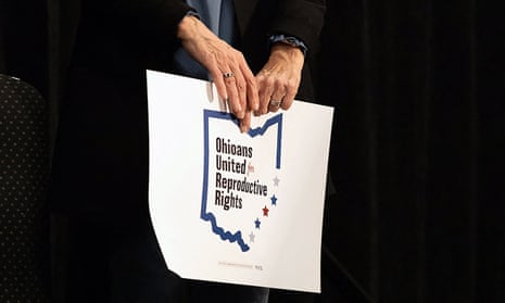 An abortion rights supporter holds a sign after winning the referendum on Issue 1, a measure to enshrine the procedure in Ohio's constitution.