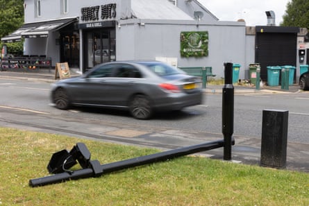 A damaged Ulez camera lies on the ground