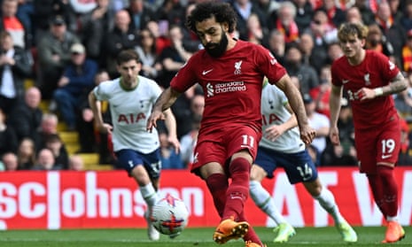 Mohamed Salah (centre) scores Liverpool’s third goal from the penalty spot during the Premier League match between Liverpool and Tottenham Hotspur at Anfield on April 30, 2023.