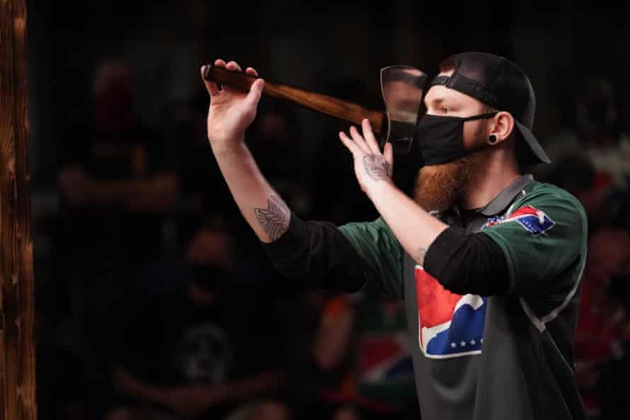 A man about to throw an axe