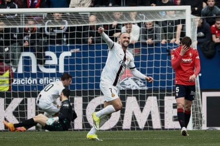 Mallorca’s Vedat Muriqi wheels away after scoring his second goal