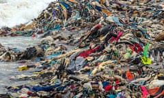 Discarded secondhand clothes cover the beach in the  fishing community of Jamestown in Accra, Ghana.