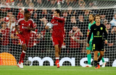 Dominik Szoboszlai celebrates scoring their first goal alongside Alexander Isak.