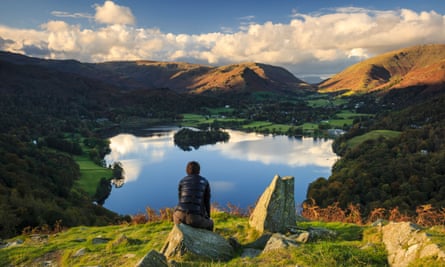 A walker admires the view of Grasmere from Loughrigg fell - as Dorothy Wordsworth would have two centuries earlier.
