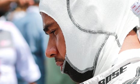 Lewis Hamilton pictured before the start of the Malaysia Grand Prix, which he was on course to win before his engine blew up with just 15 laps left. 