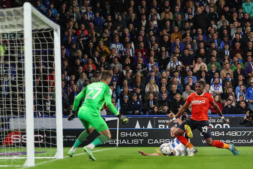 Huddersfield Town's Jordan Rhodes scores and makes it 1-0.