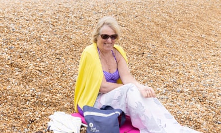Diane sitting on the beach