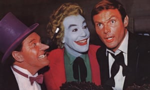Burgess Meredith as the Penguin, with Cesar Romero as the Joker and Adam West as Bruce Wayne in Batman (1966).