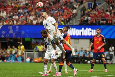 Roberto Lopes climbs highest to triumph a header against Spain