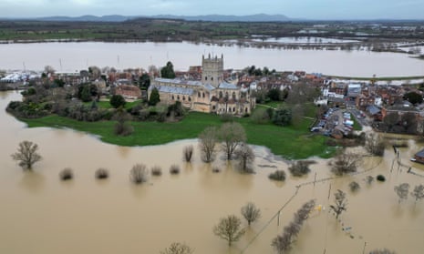 Tewkesbury Abbey surrounded by flood waters