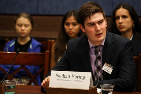 A student speaks into a microphone.