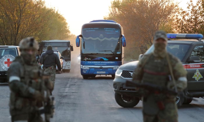 A bus carrying civilians evacuated from Azovstal steel plant in Mariupol arrives at a temporary accommodation centre in the village of Bezimenne on Friday.