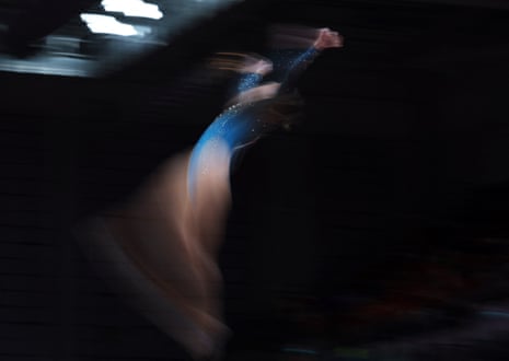 A slow shutter speed image of Australia's Breanna Scott in action on the beam.