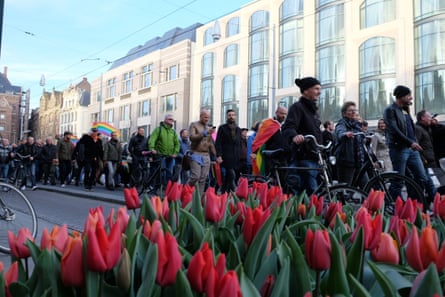 Protesters march through Amsterdam on Wednesday.