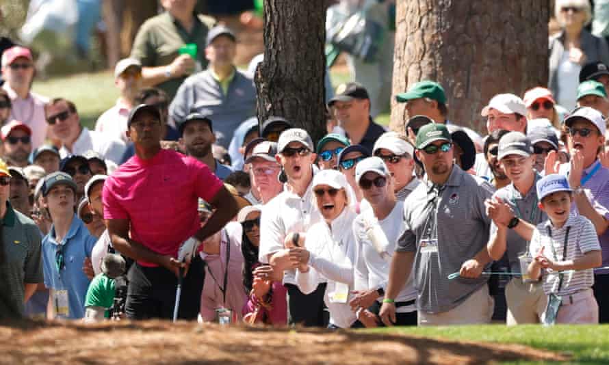 Tiger Woods heads down the 14th.