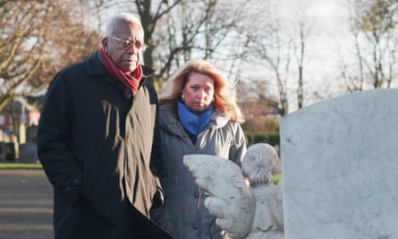 Trevor McDonald with Denise Fergus at her son’s graveside.